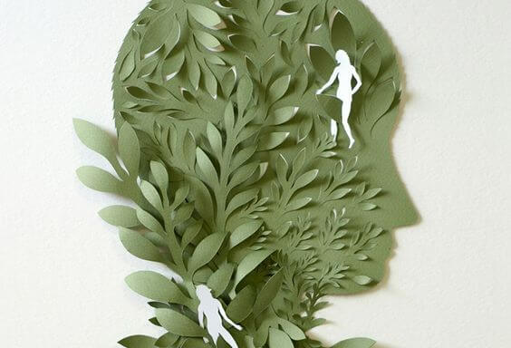 Hoved lavet som blad med mennesker på