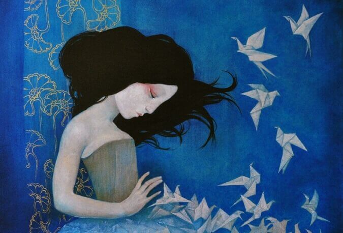 Pige med fugle af papir