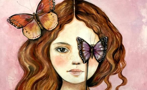 Kvinde har sommerfugl som øjet for at symbolisere energityve