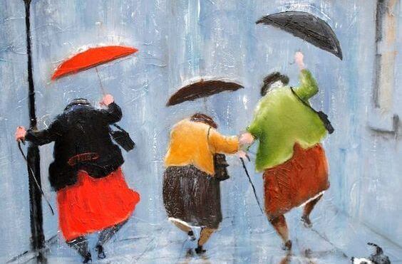 Ældre damer danser i regnen og lader sige ikke begrænse af deres alder