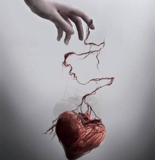 Person holder hjerte i tråd som symbol på følelsesmæssig mishandling