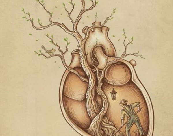 Mand i er træ formet som et menneskehjerte