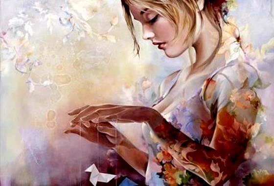 Kvinde styrer dukker og tænker "jeg skriver selv mit livs bog"