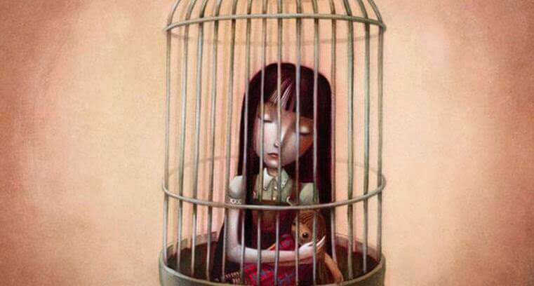 Pige i bur symboliserer følelsesmæssig mishandling