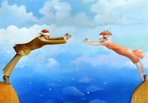 Et par med bind for øjnene hopper fra klippe og mod hinanden