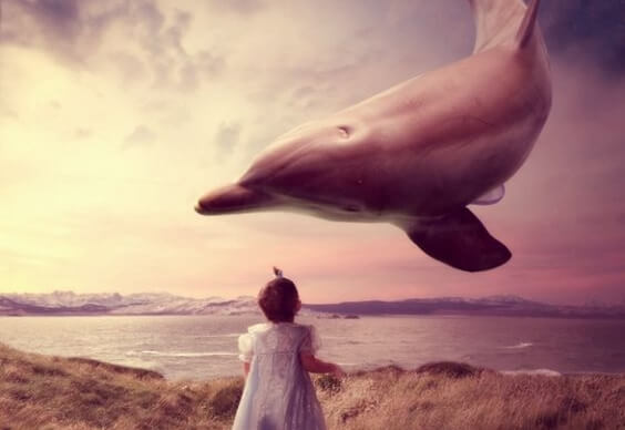Flyvende delfin leger med piger