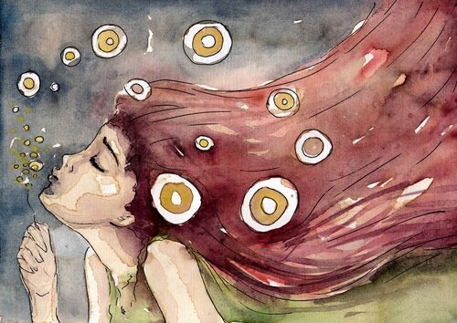 Pige puster sæbebobler