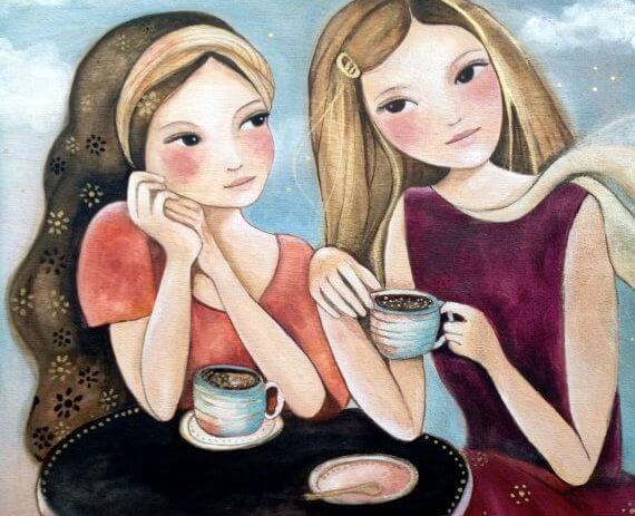 Veninder drikker kaffe sammen og nyder venskab