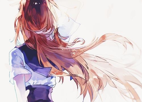 Kvinde med vind i håret