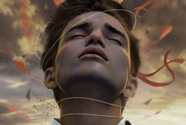 Mand med grå himmel bag sig