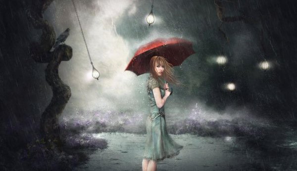 Kvinde i regn med paraply