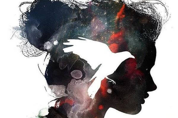 Silhuet af kvinde med fugl