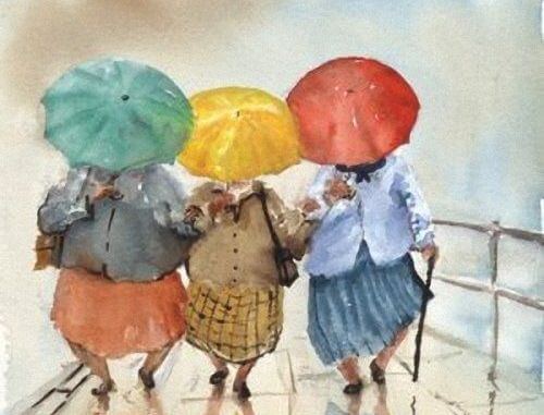 Venner gemmer sig bag paraplyer