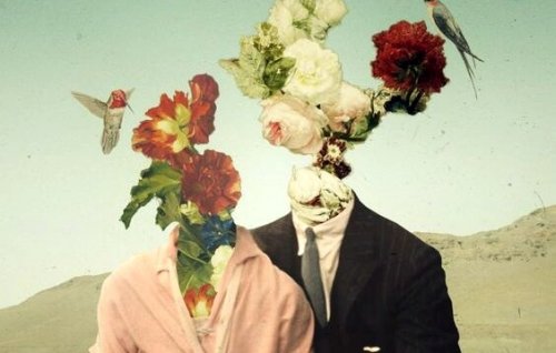 Par med blomster som hoveder