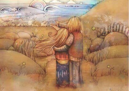 Par krammer foran landskab og nyder, at de kan tolerere mangler