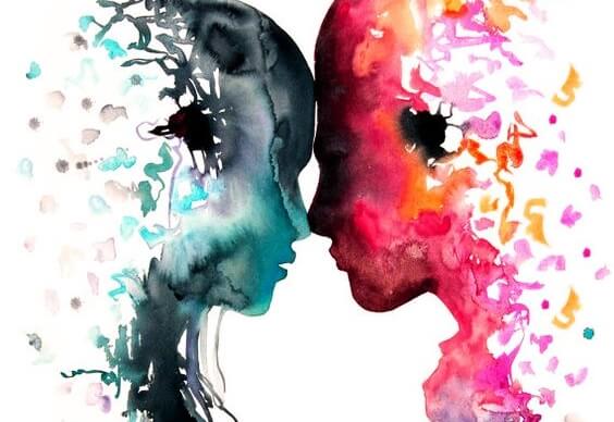 Personer i farver med hoved mod hinanden