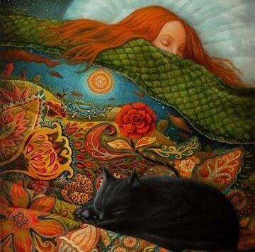 Kvinde sover med kat