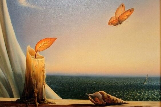 Sommerfugl flyver fra stearinlys