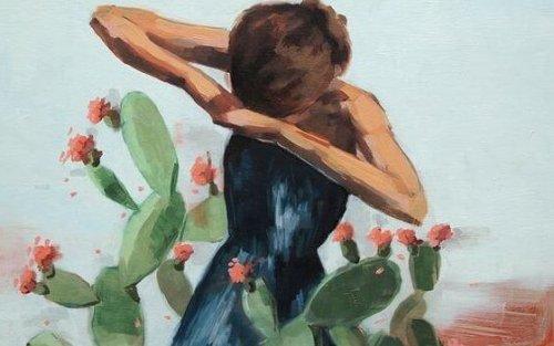 Kvinde over kaktus
