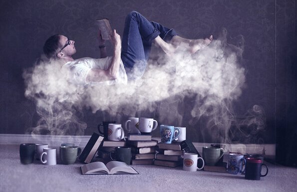 Svævende mand med bog illustrerer forbindelsen mellem læsning og hjernen