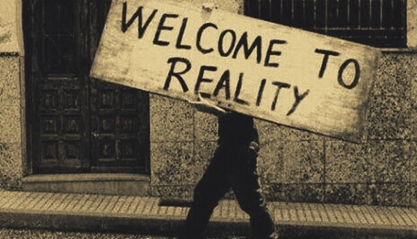Skilt, hvor der står, welcome to reality
