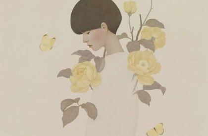 Kvinde blandt gule blomster