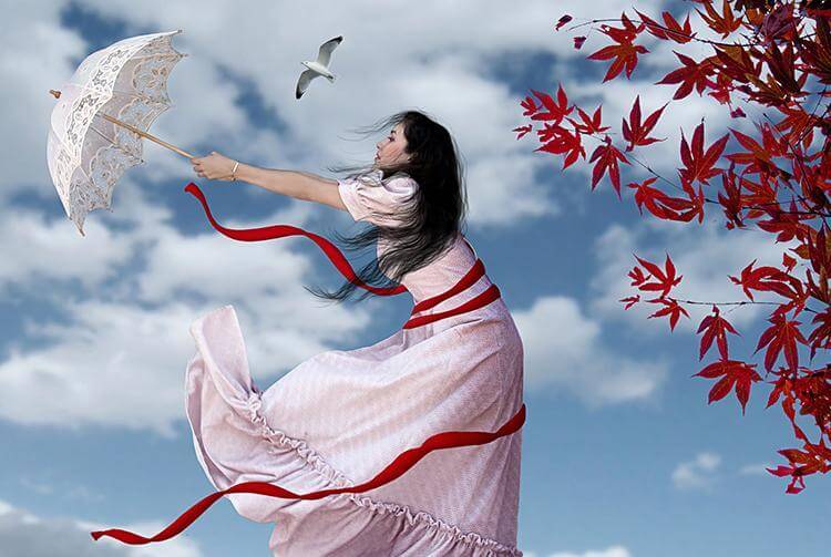 Kvinde i vind med paraply siger, jeg lader dig ikke gå