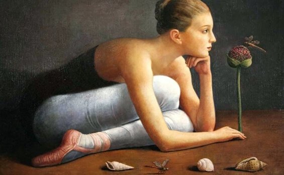 Ballerina ligger på gulv og tænker over social viden