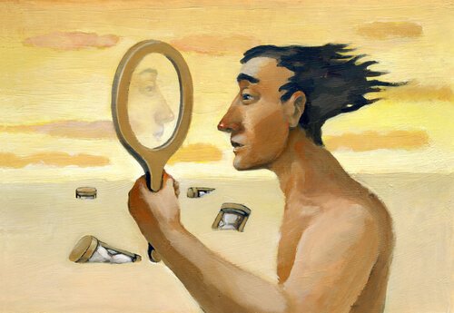 Mand i ørken ser i spejl for at studere hans personlighedstræk