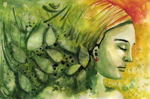 Maling af en kvindes ansigt med grønne gule og orange farver omkring sig