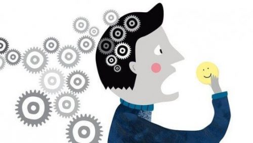 Person med tandhjul i hovedet spiser smiley