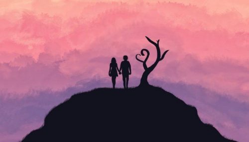 Et par står på toppen af et bjerg foran lilla himmel