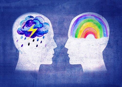 Skits af to hoveder med regnbue og regnvejr som hjerne