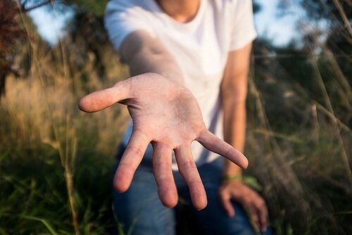 Åben hånd, som symboliserer filantropi