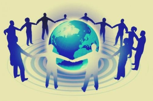 Mennesker holder hånd rundt om kloden