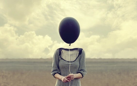 menneske med ballon som hoved