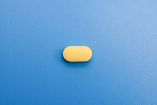 gul pille på blå baggrund