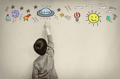 Dreng, der peger på animeret figur