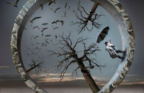 Hjul med træer og mand med paraply