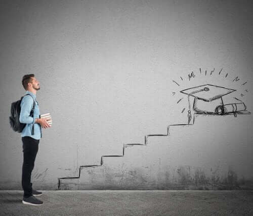 Mand, der står for enden af en tegnet trappe på væg