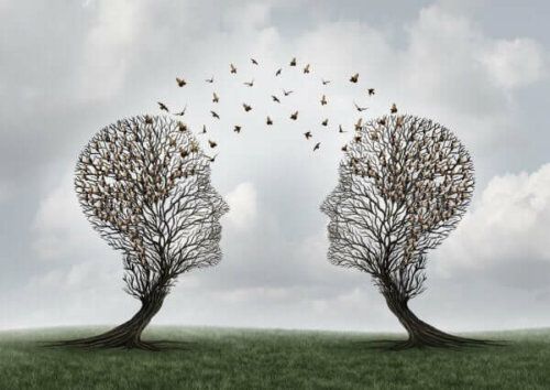 To træer formert som hoveder, der udveksler tanker, symboliserer kommunikationsstile